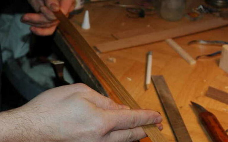Pose d'une mèche d'archet